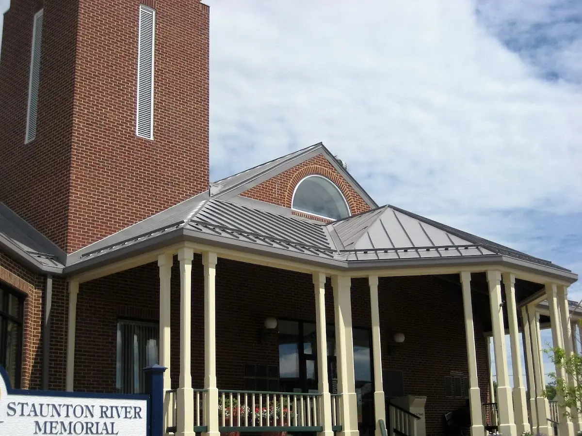 Skilled roofing craftsmen working on a residential roof in Cheyenne